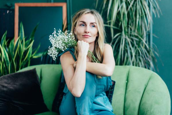 Lady sitting in green room