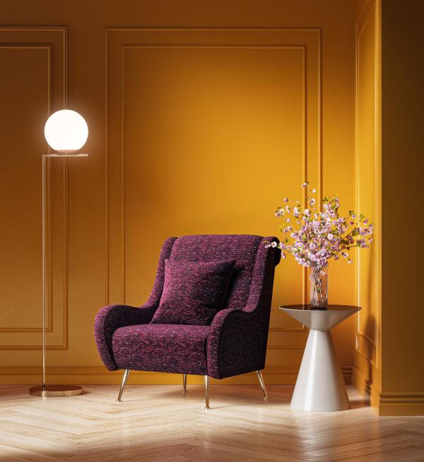Elgin on chair with yellow paint